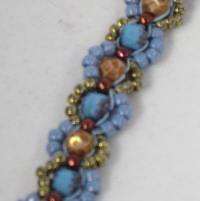 Bracelet de perles de Bohème facettées marbrées brunes et perles à facettes antiques turquoises